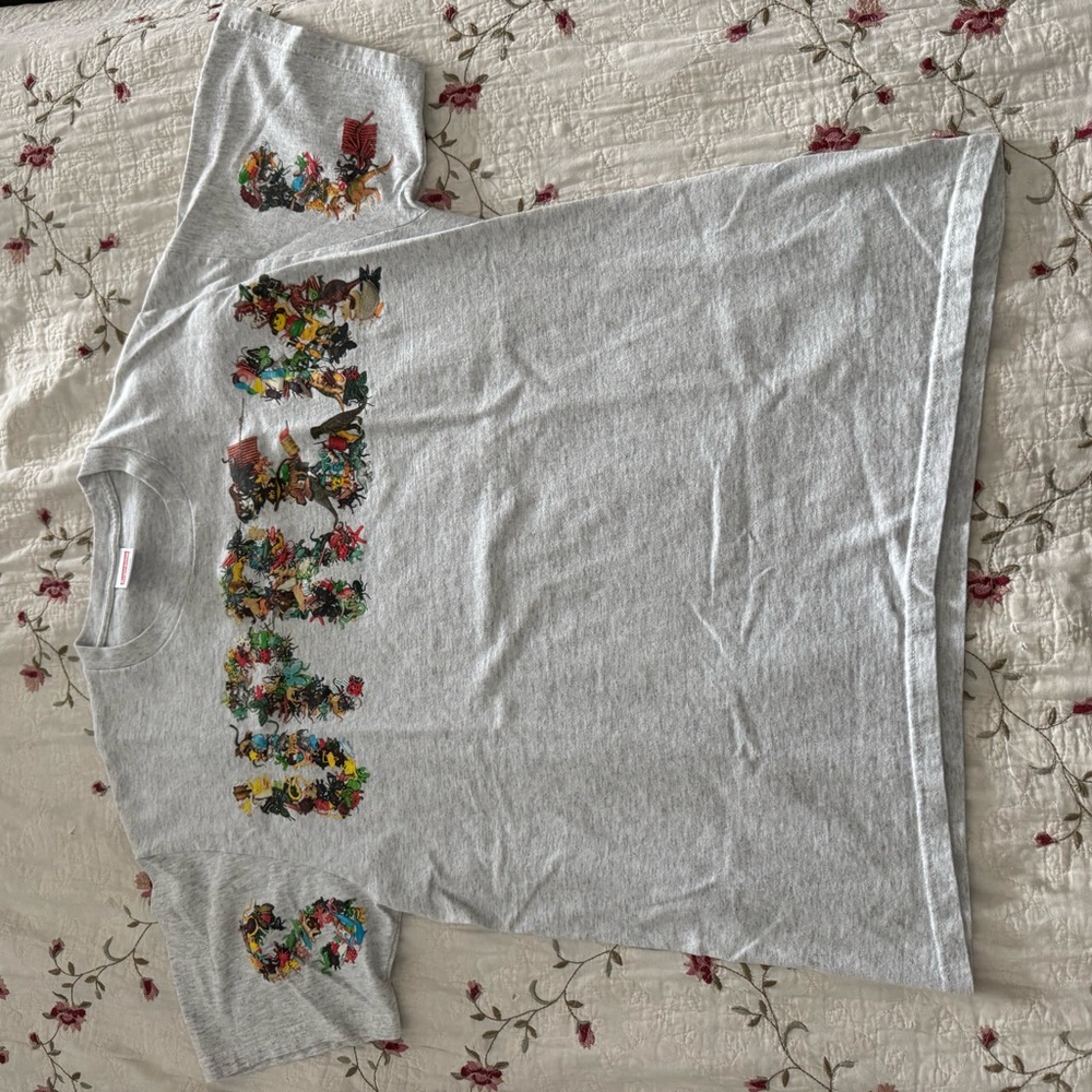 Supreme “Toy Pile” Heather Gray T-Shirt